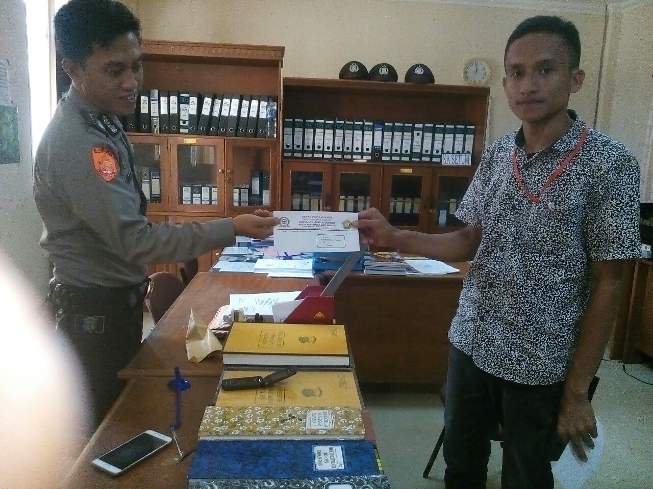 Masyarakat Laporkan Dugaan Korupsi ADD Kades Sandi ke Polda Sultra