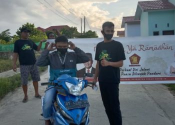 Gerindra Ranting Anawai Bagi Masker dan Buka Puasa Bersama